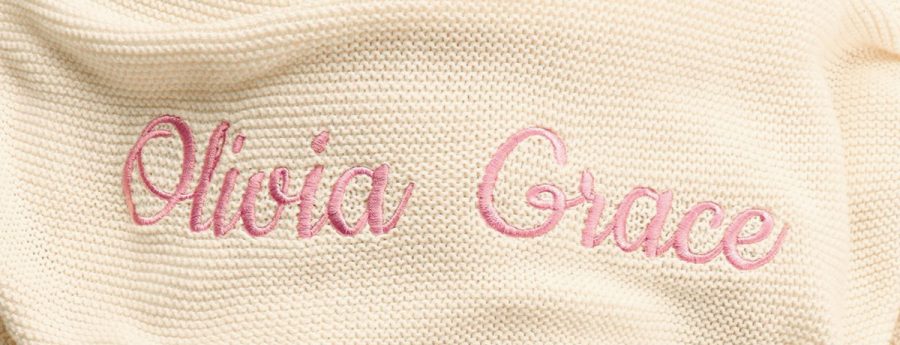 Close-up of the real hand embroidery on the knit